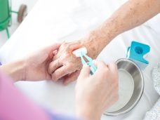 Nurse,Cleaning,Wound,With,Cotton,Ball,And,Dressing,Set,,Wound